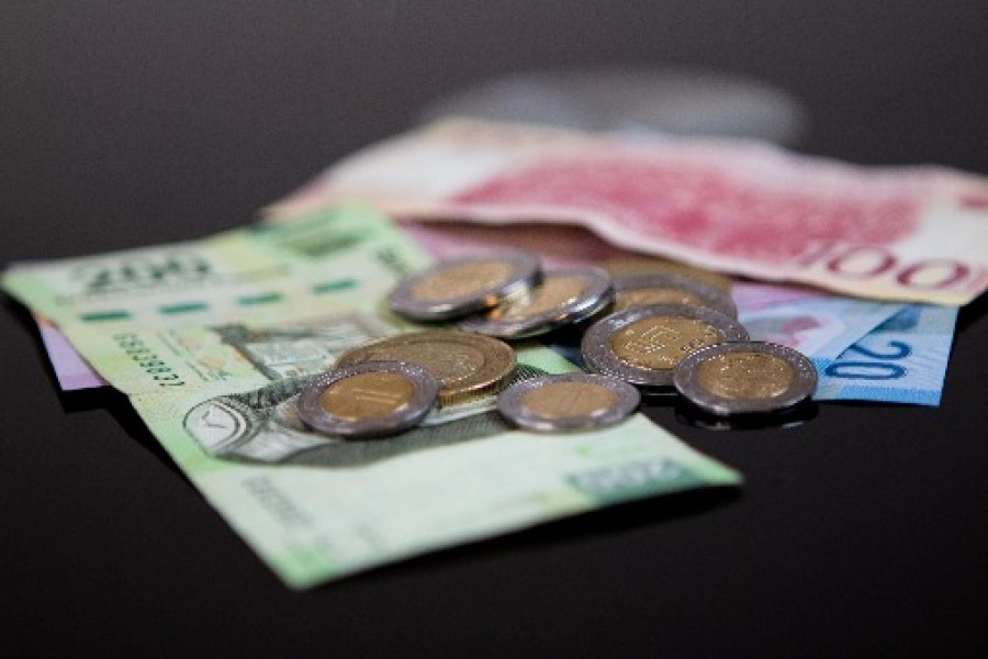 El peso mexicano se debilita ante el dólar. Foto archivo