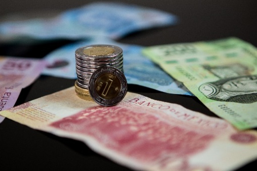Moneda mexicana gana terreno ante el dólar. Foto archivo
